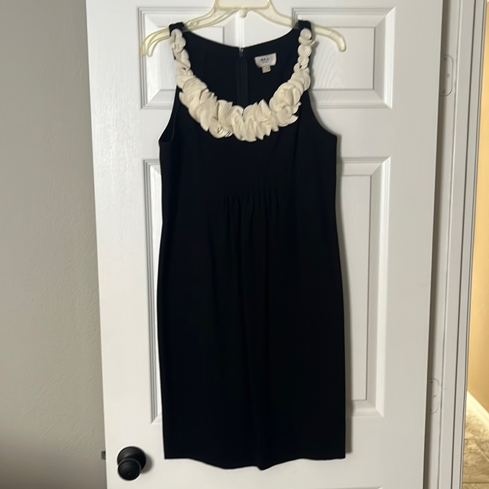 Black dress with cream flower detail